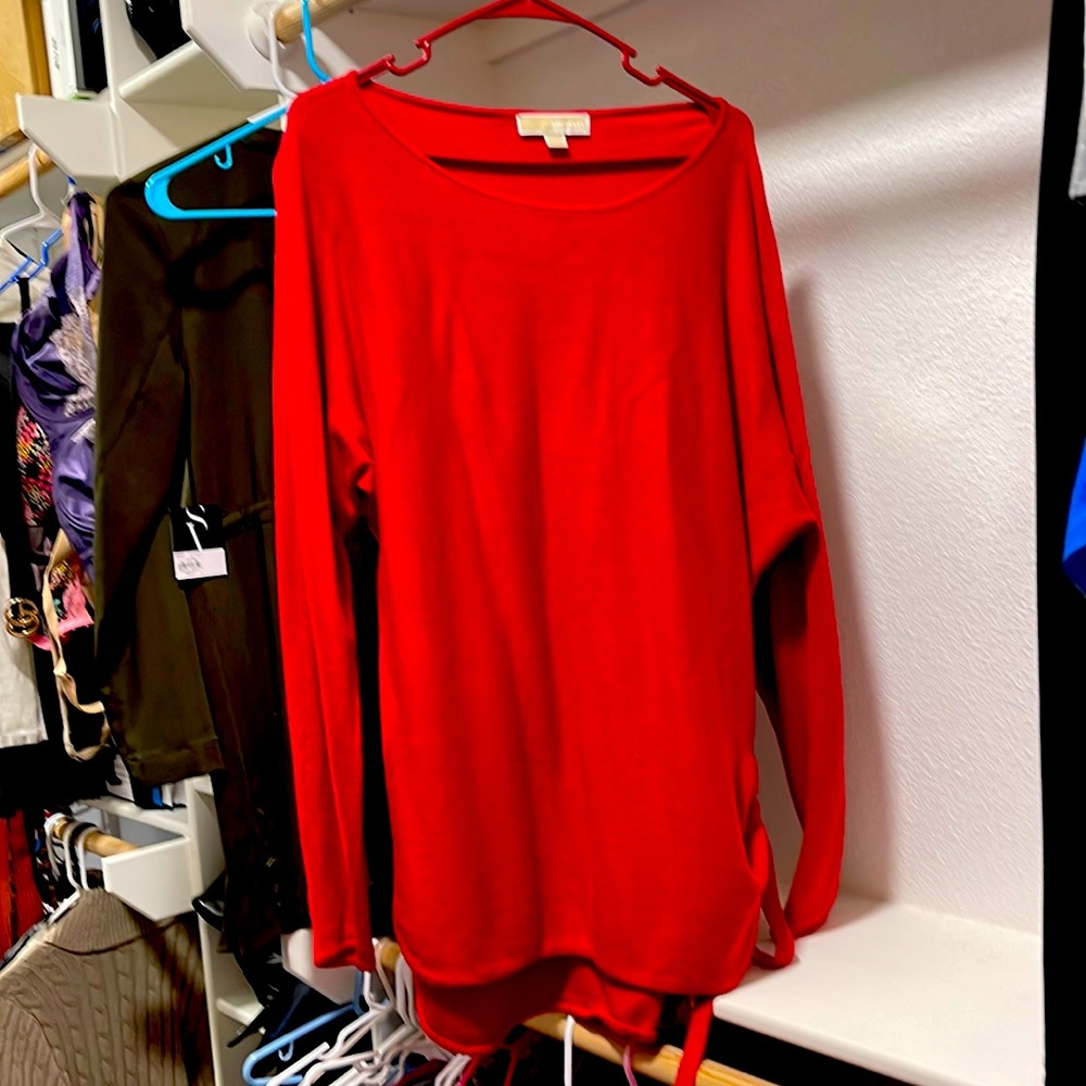 Worn two times. Very nice sweater.